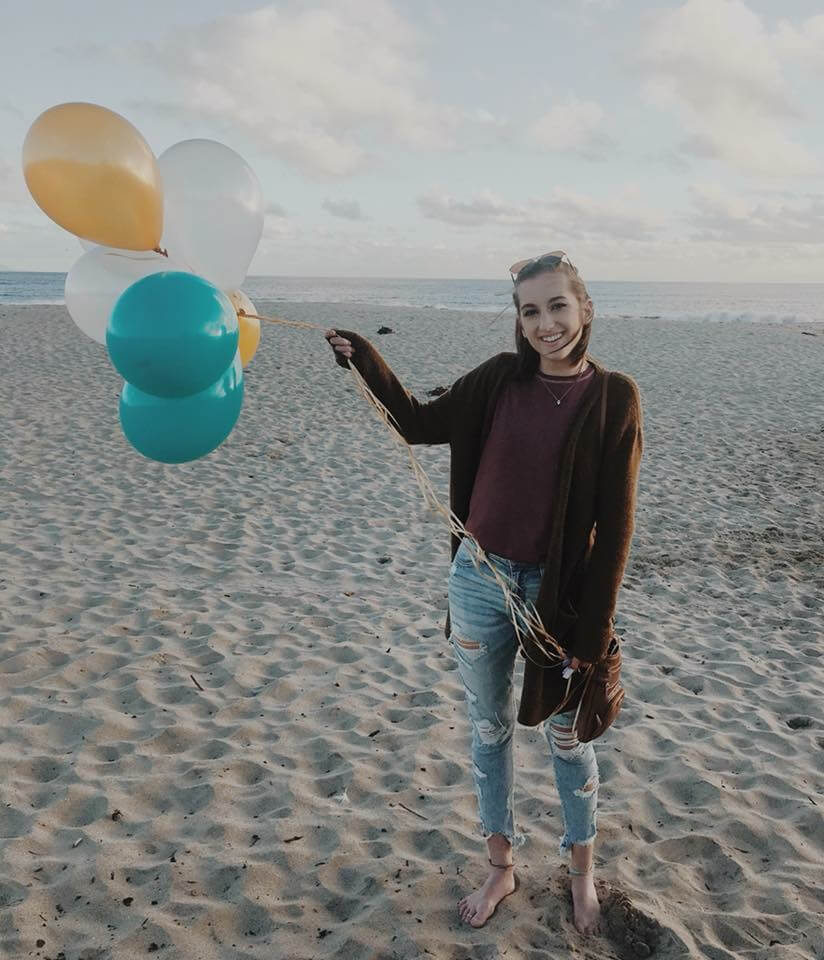 Camille with balloons